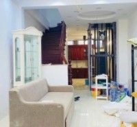 Bán nhà Thái Hà, Đống Đa sổ đỏ 63m - Ngõ thông, thang máy 2 thoáng vĩnh viễn